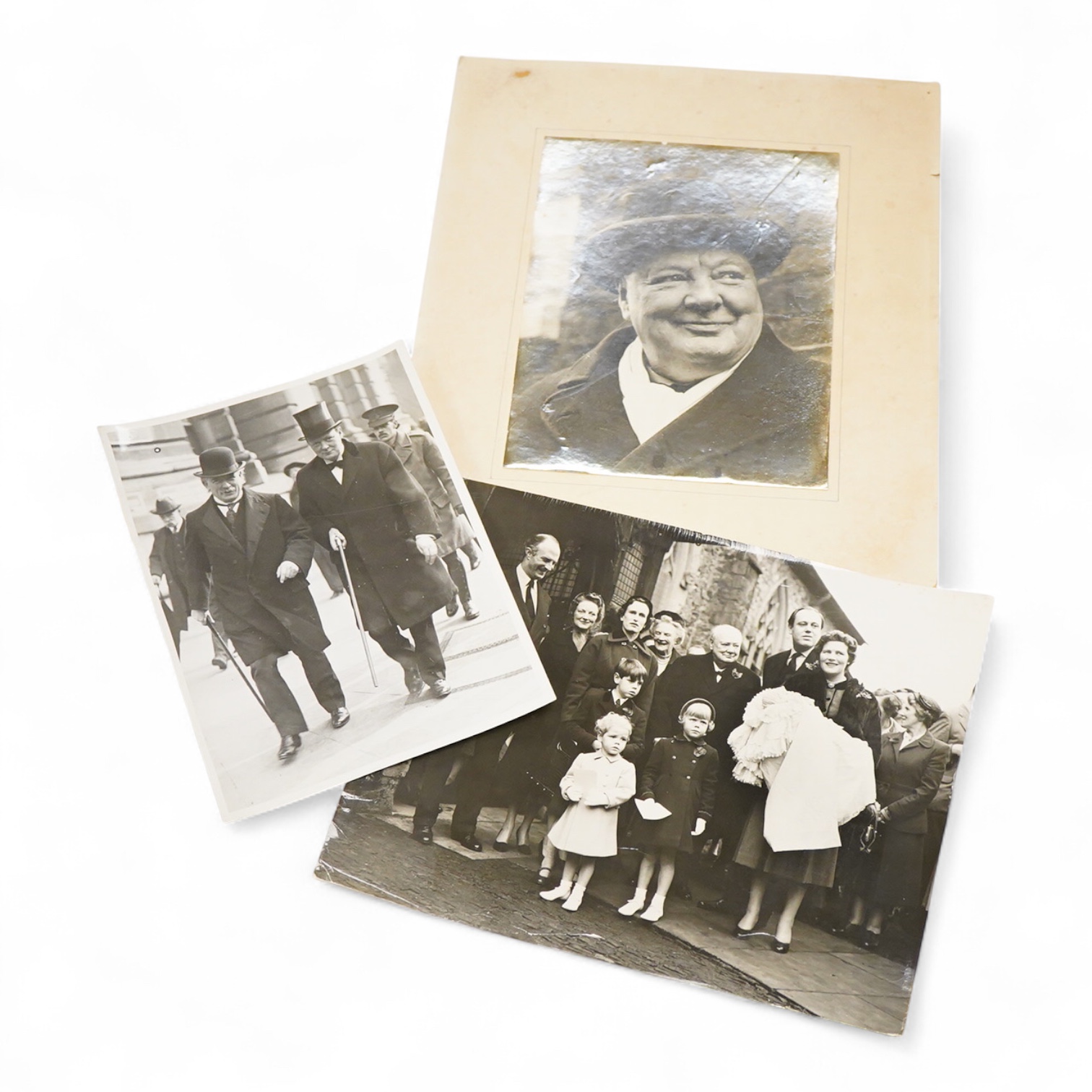 Four 20th century black and white agency photographs of Winston Churchill, together with a watercolour of Vera C.Clark by Vivian Entwistle